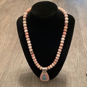 Pink stone necklace with pendant